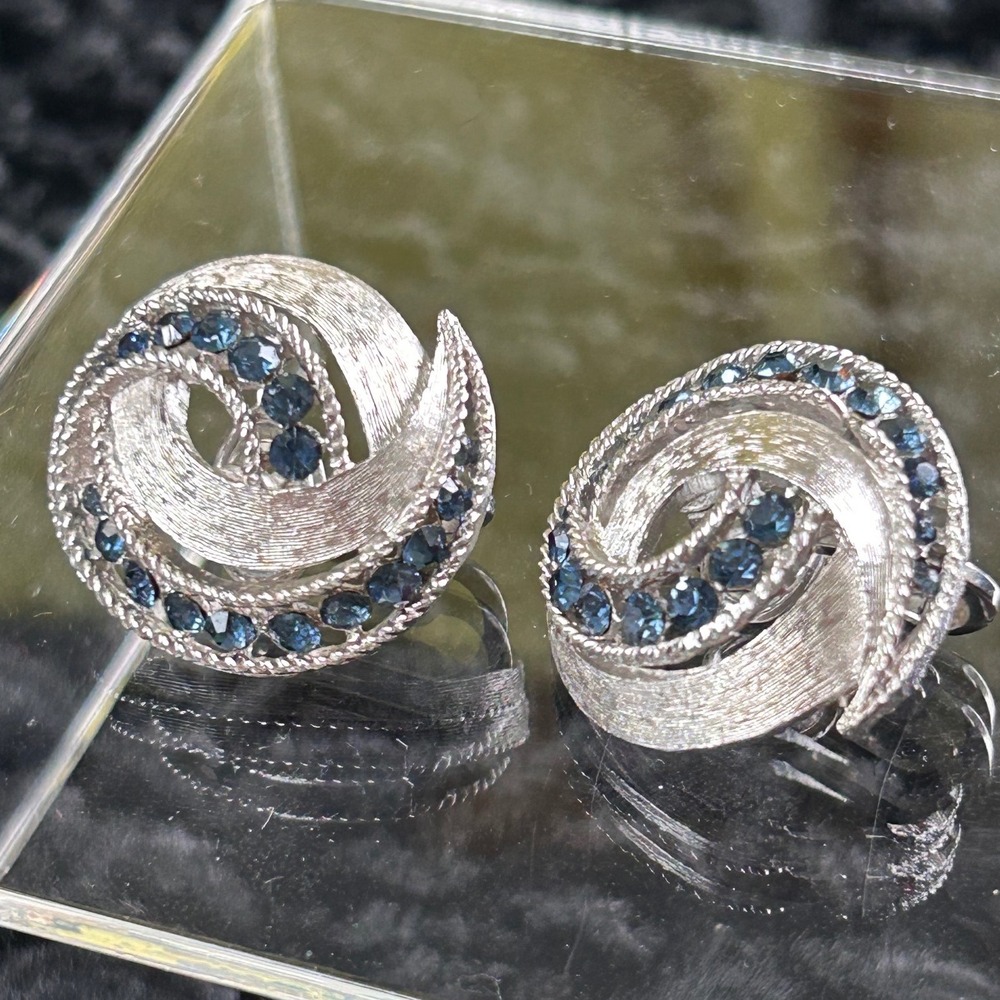 Crown Trifari Vintage Silver Tone Blue Rhinestone Swirl Clip On Earrings Signed